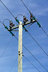 power lines against blue sky