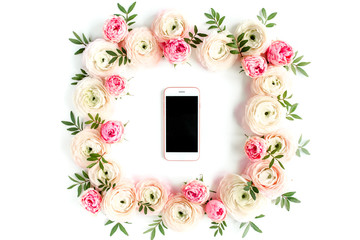 Phone in frame of pink ranunculus flowers on white background. Flat lay, top view mock up