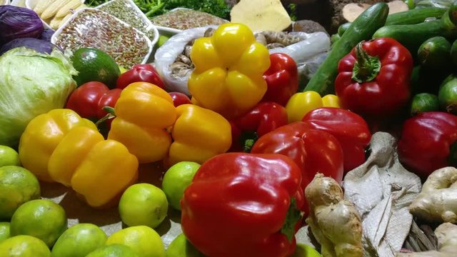 Multicolored capsicum panning shot at local vegetable market sabzi mandi in india