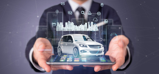 Businessman holding Dashboard smartcar interface with multimedia icon and city map on a background 3d rendering