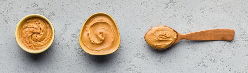 Bowls and spoon with peanut butter