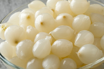 Glass bowl with traditional pickled silverskin onions