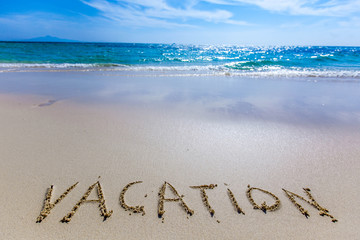 Vacation writing on a beach