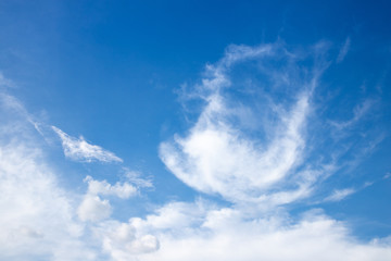 Naklejka na ściany i meble white strange cloud on blue sky in summer time. abstract cloudscape.