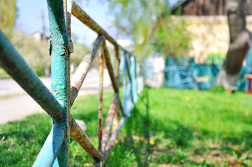 old unpainted iron fence