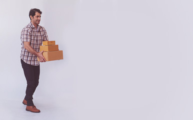 Asian young man holding box package, delivery man