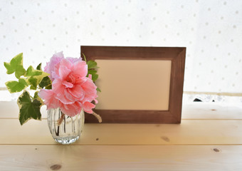 Pink Azalea in vase, blank  frame,on wooden background(32-1)