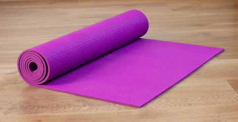 exercise mat on wood floor