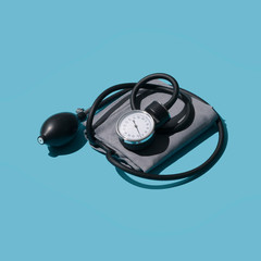 Sphygmomanometer and blood pressure measurement: hypertension and heart attack prevention concept