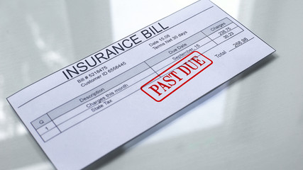 Insurance bill past due, seal stamped on document, payment for services, tariff
