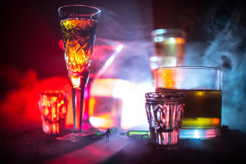 Selection of alcoholic drinks on rustic wood background. Creative artwork decoration