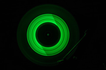 Concept of speed - Trail of fire and smoke - Vinyl record. Burning vinyl disk. Turntable vinyl record player. Retro audio equipment for disc jockey. Sound technology