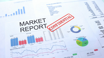Market report confidential, seal stamped on official document, business project