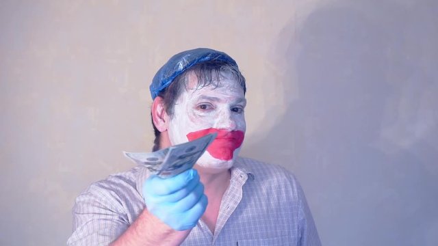 excerpt from the short speech of the funny actor men mime.actor performs with a stack of hundred dollar bills.pantomime.