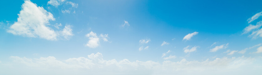 Naklejka na ściany i meble Blue sky with white clouds in the summer