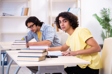 Two male students in the classroom