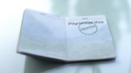 Pilgrimage visa granted, seal stamped in passport, customs office, travelling