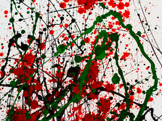 splashes on red and black and green paint
