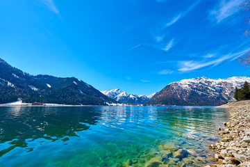 Fototapeta na wymiar Beautiful landscape of lake Achen on a sunny day in the Austrian Alps. Photo taken in Spring.