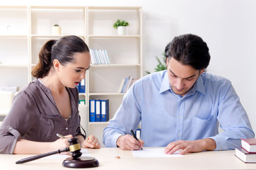 Fototapeta premium Young family in marriage divorce concept 