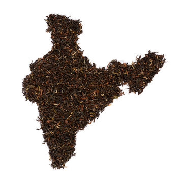 Loose black tea. The contour of the India is made of Indian Assam tea isolated on white background