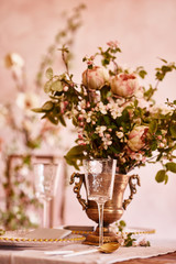 Vintage wedding decor. Beautiful event venue. Creative decoration. Pink and gold color. Wedding calligraphy menu