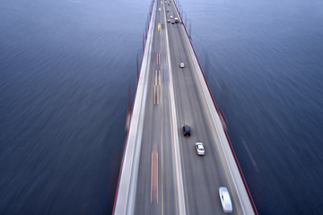 View at city bridge with traffic through river