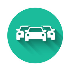 White Cars icon isolated with long shadow. Green circle button. Vector Illustration