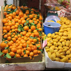 Oranges and potatoes on a street market in Hong Kong