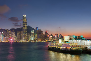 Fototapeta premium Victoria Harbor of Hong Kong city under sunset