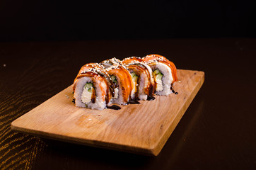 Traditional Japanese cuisine. Sushi restaurant menu. Rolls maki with tuna, eel and avocado.