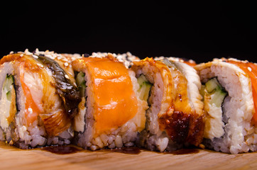 Traditional Japanese cuisine. Sushi restaurant menu. Rolls maki with tuna, eel and avocado.