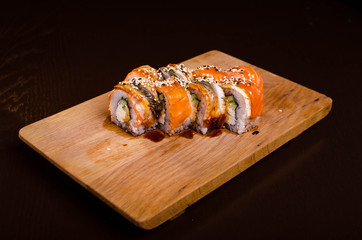 Traditional Japanese cuisine. Sushi restaurant menu. Rolls maki with tuna, eel and avocado.