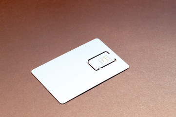 plastic card with SIM card close-up
