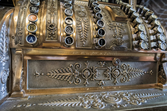 Close up od old cash machine in cafe in Chernivtsi, Ukraine. Vintage business concept.  Finance and currency concept. Bukovina, Eastern Europe. 