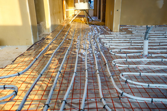 Close up on water floor heating system interior