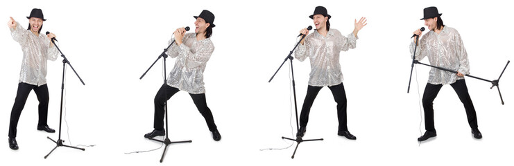 Young man singing with microphone isolated on white 