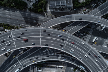Fototapeta premium Aerial view of Nanpu Bridge Nanpu Bridge Approach Bridge in Shanghai, the Chinese characters on the road indicate where you are going, it means 