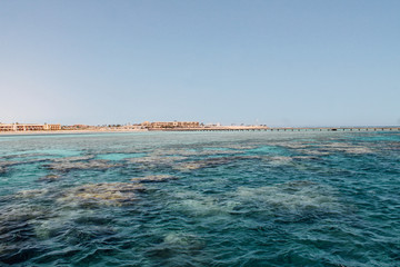 Paradise island with turquoise water and white sand