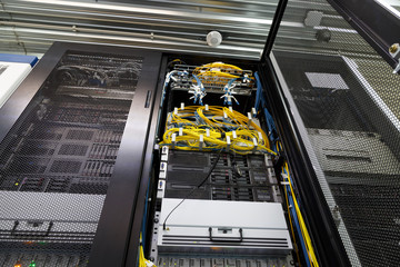 Stand with server hardware interior with twisting wires and cables