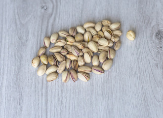 Healthy food  for background image close up pistachios nuts. Texture Nuts on top view mock up