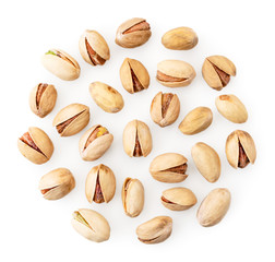 Salted pistachios on a white, isolated. The form of the top.