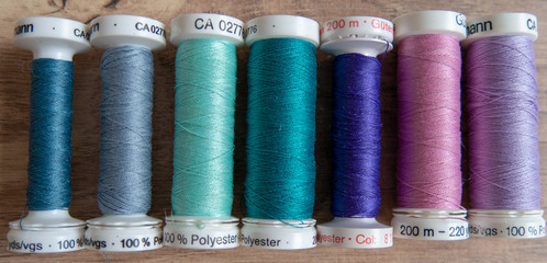 collorfull yarn on a wooden background