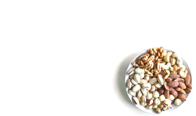 Healthy food. Nuts mix assortment on white grey table top view. Collection of different legumes for background image close up nuts, pistachios, almond, cashew nuts, peanut, walnut. image
