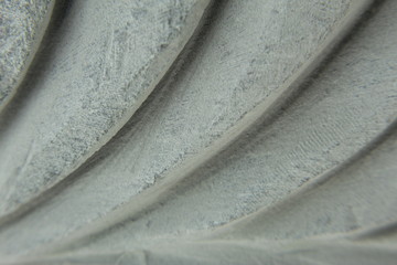 Dry and dusty carved granite stone closeup