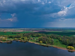 Fototapeta premium landscape with river and clouds in Minsk Region of Belarus