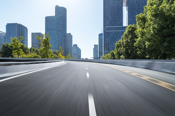 Empty road floor surface with modern city landmark buildings of hangzhou bund Skyline,zhejiang,china