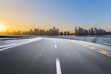 Empty road floor surface with modern city landmark buildings of hangzhou bund Skyline,zhejiang,china