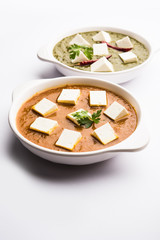 spinach cheese cottage and paneer butter masala served in bowl, selective focus