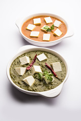 spinach cheese cottage and paneer butter masala served in bowl, selective focus
